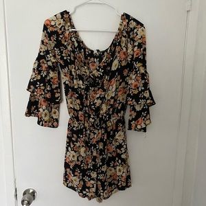 Black floral ruffle sleeve romper